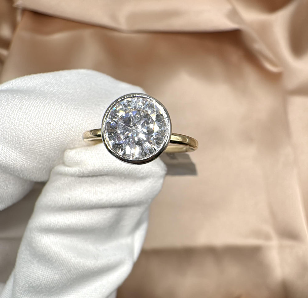 Buy Round Bezel Two-Tone Lab-Grown Diamond Solitaire Ring